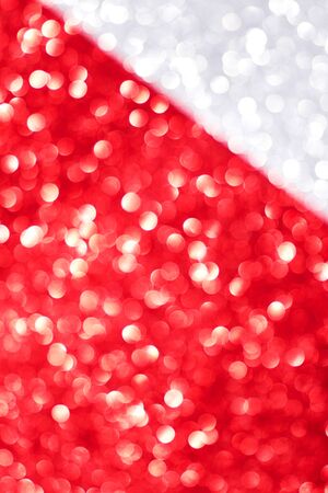 Silver and red glitter texture background, sparkling Christmas wallpaper.の写真素材