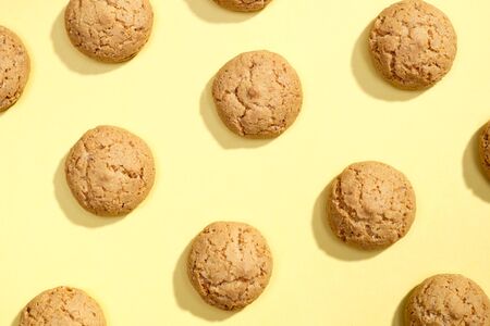 Pattern of cookies. Cookies on a yellow background. Flat layの写真素材