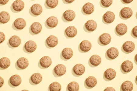 Pattern of cookies. Cookies on a yellow background. Flat layの写真素材