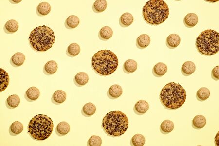 Pattern of cookies. Cookies on a yellow background. Flat lay