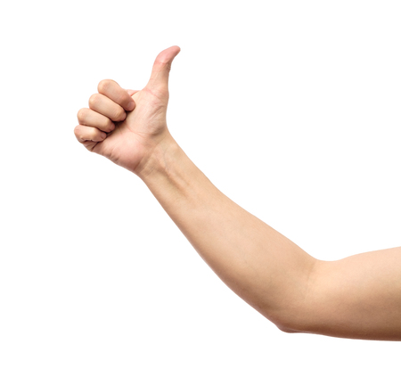 Closeup of male hand showing thumbs up sign against white backgroundの写真素材