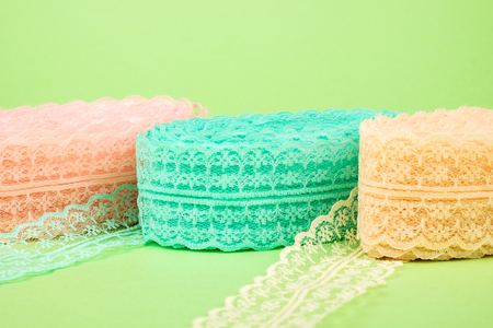 Closeup of ribbon roll over colorful background isolatedの写真素材