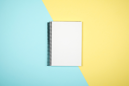 Blank writing pad for ideas and inspiration on colored backgroundの写真素材