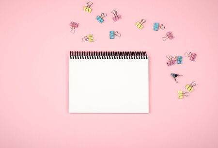 Blank writing pad for ideas and inspiration on colored background
