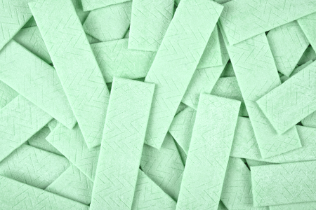 Textured background made out of many chewing gum platesの写真素材