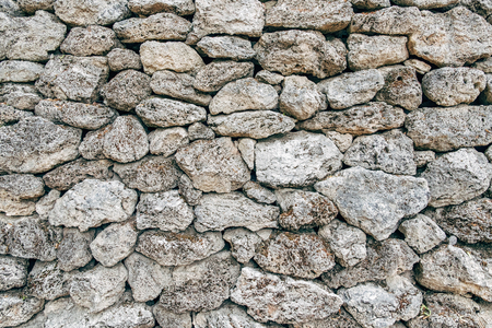Old gray stone wall textures backgroundの写真素材
