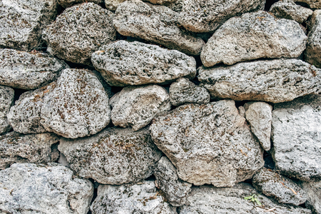 Old gray stone wall textures backgroundの写真素材