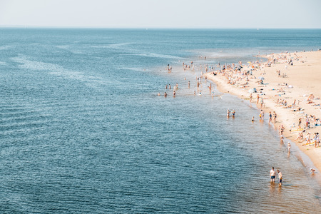 Crowded city beach at the summer dayの写真素材