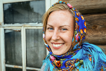 Beautiful girl in Russian folk shawl. Traditional dressの写真素材
