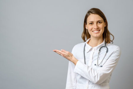Young handsome doctor woman wearing stethoscope over isolated background smiling cheerful,...