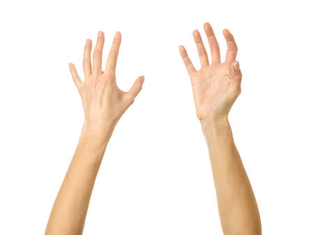 Reaching hand. Woman hand with french manicure gesturing isolated on white background. Part of...