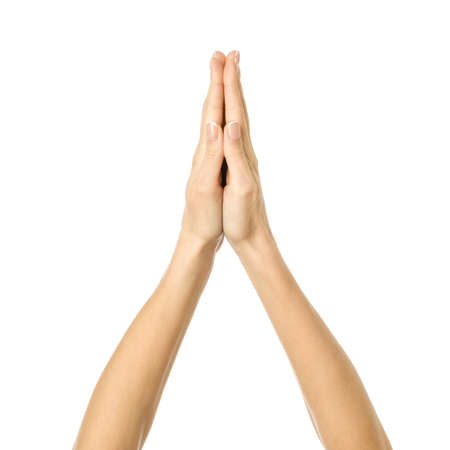 Holding or measuring hands. Woman hand gesturing isolated on whiteの写真素材