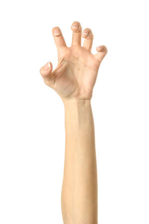 Pulling, grabbing, reaching or scratching. Woman hand with french manicure gesturing isolated on white background. Part of seriesの写真素材