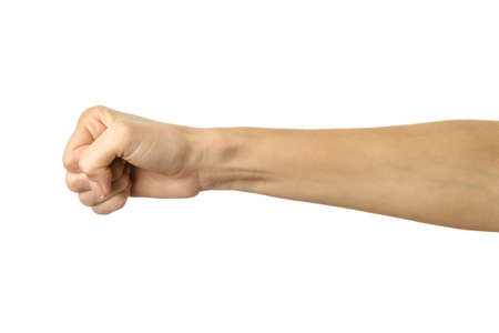 Hand clenched in a fist. Horizontal image. Woman hand with french manicure gesturing isolated on white background. Part of seriesの写真素材