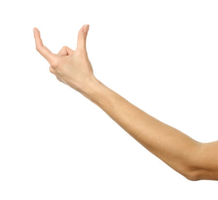 Measuring invisible item. Woman hand with french manicure gesturing isolated on white background. Part of seriesの写真素材