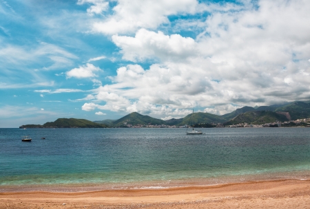 Sea beach at montenegro, mountains on horrizonの写真素材