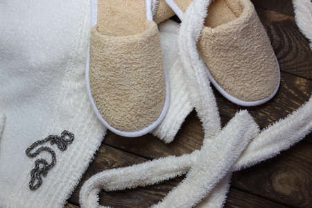 Terry bathrobe and bath slippers