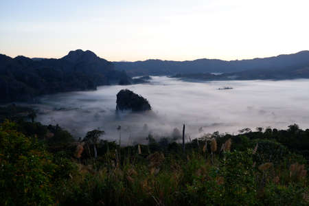 Morning mist at Pha Chang Noi Viewpoint, Phu Langka National Park, Phayao Province, Thailandの写真素材
