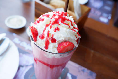 Strawberry milkshake with whipped creamの写真素材