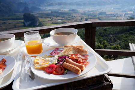 Breakfast with Mountain view in thailandの写真素材