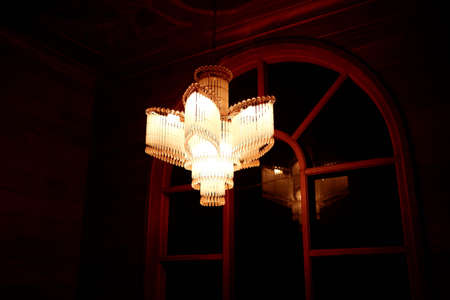 A Flower Chandelier light in the Center of the Staircaseの写真素材