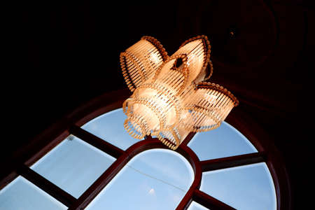 A Flower Chandelier light in the Center of the Staircaseの写真素材