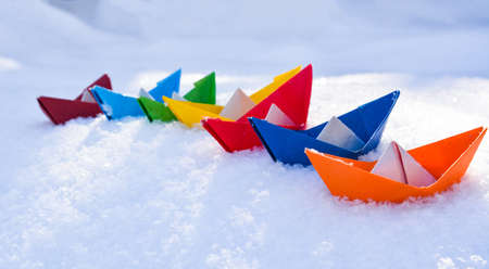 Paper boat on the snow