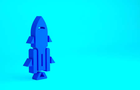 Blue Rocket ship with fire icon isolated on blue background. Space travel. Minimalism concept. 3d illustration 3D renderの写真素材