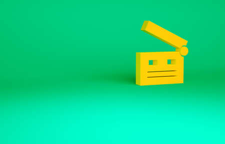 Orange Movie clapper icon isolated on green background. Film clapper board. Clapperboard sign....