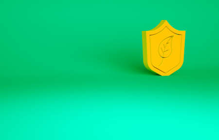 Orange Shield with leaf icon isolated on green background. Eco-friendly security shield with leaf. Minimalism concept. 3d illustration 3D renderの写真素材
