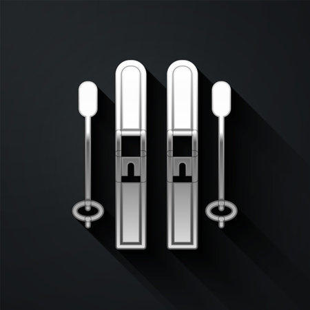 Silver Ski and sticks icon isolated on black background. Extreme sport. Skiing equipment. Winter sports icon. Long shadow style. Vectorのイラスト素材