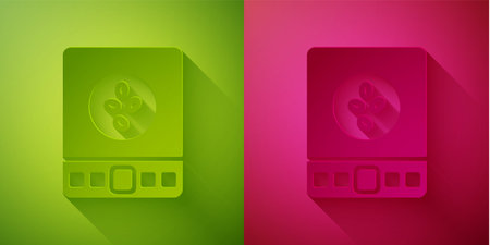 Paper cut Electronic coffee scales icon isolated on green and pink background. Weight measure equipment. Paper art style. Vector Illustrationのイラスト素材
