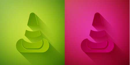 Paper cut Traffic cone icon isolated on green and pink background. Paper art style. Vectorのイラスト素材