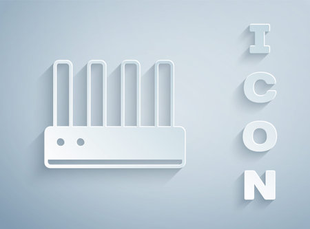 Paper cut Router and wifi signal icon isolated on grey background. Wireless modem router. Computer technology internet. Paper art style. Vectorのイラスト素材