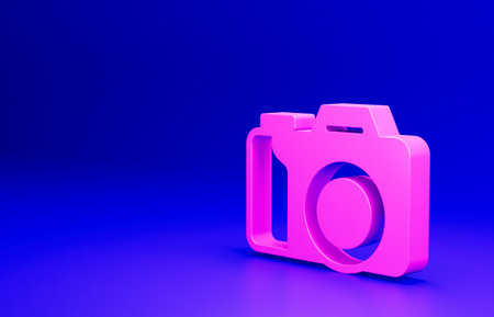 Pink Photo camera icon isolated on blue background. Foto camera. Digital photography. Minimalism concept. 3D render illustrationの写真素材