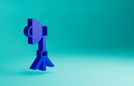 Blue Studio light bulb in softbox icon isolated on blue background. Shadow reflection design. Minimalism concept. 3D render illustrationの写真素材