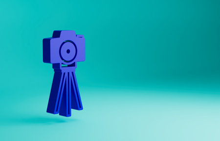 Blue Photo camera icon isolated on blue background. Foto camera. Digital photography. Minimalism concept. 3D render illustrationの写真素材