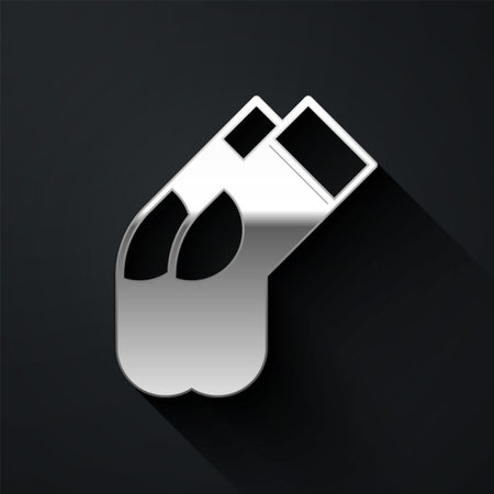 Silver Socks icon isolated on black background. Long shadow style. Vectorのイラスト素材