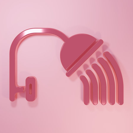 Pink Shower head with water drops flowing icon isolated on pink background. Minimalism concept. 3D render illustration.の写真素材