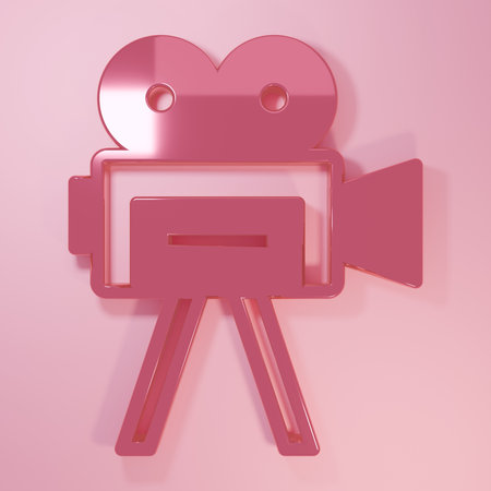 Pink Retro cinema camera icon isolated on pink background. Video camera. Movie sign. Film projector. Minimalism concept. 3D render illustration.の写真素材