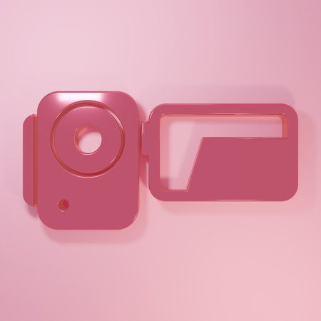 Pink Cinema camera icon isolated on pink background. Video camera. Movie sign. Film projector. Minimalism concept. 3D render illustration.の写真素材