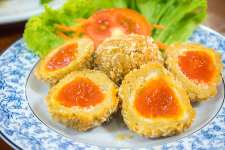 fried salted egg the food of thailandの写真素材