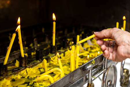 Yellow candle culture of thailandの写真素材