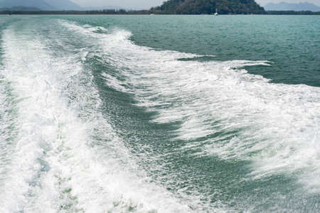 Bubble waves from boats in the sea