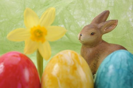 easter nest with eggs and bunnyの写真素材