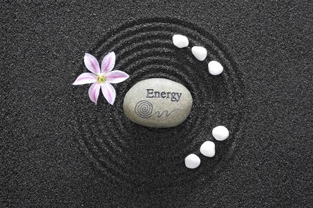 zen garden in black sandの写真素材