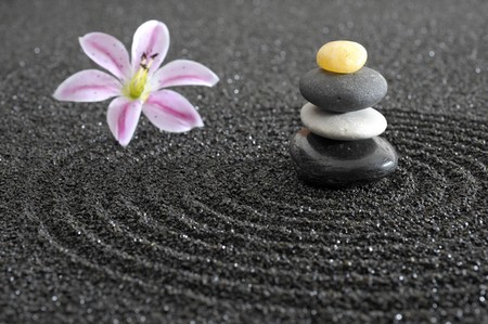 zen garden in black sandの写真素材