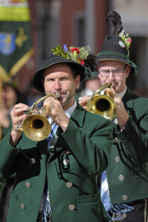 TRAUNSTEIN, GERMANY - MAY 8:  annual parade of performers in historical costumes and musicians in commemoration of ancient bavarian soldiers - at May 8, 2011 in Traunstein, Germanyのeditorial素材
