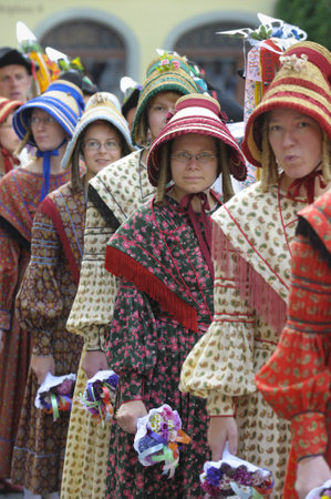 ROTHENBURG OB DER TAUBER, GERMANY - JUNE 12: performer of the annual medieval parade Meistertrunk, dressed in historical costume while an ancient dance at June 12, 2011 in Rothenburg ob der Tauber, Germanyのeditorial素材