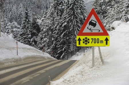 traffic sign warns of snow and iceの写真素材